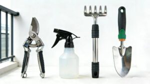 “Essential small-space gardening tools including pruners, trowel, and spray bottle