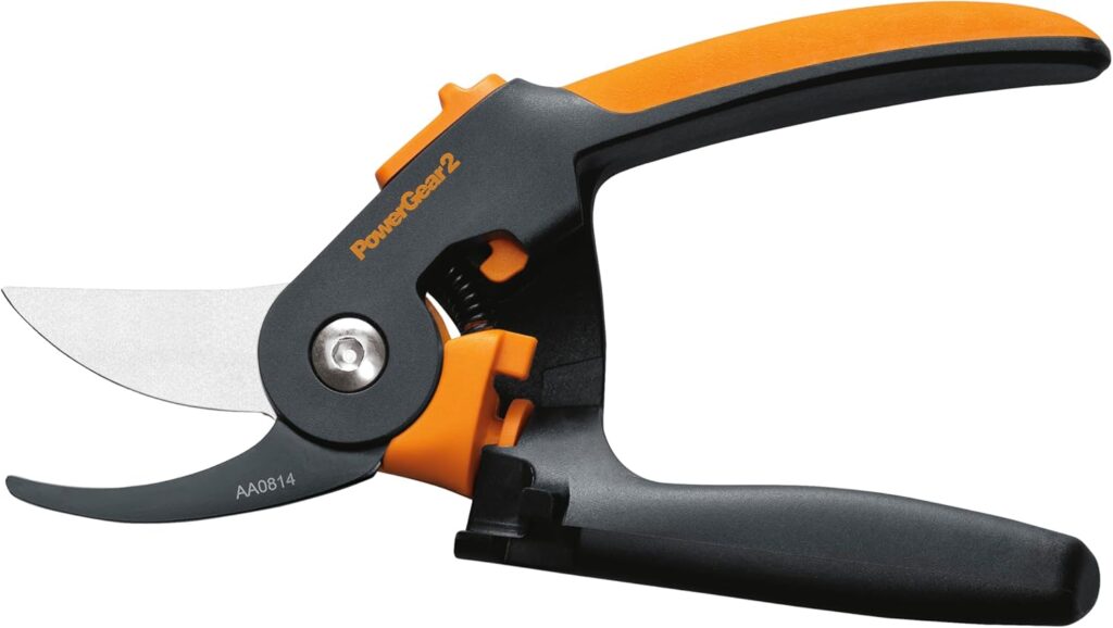 Fiskars PowerGear2 pruners with orange handles and gear mechanism close up